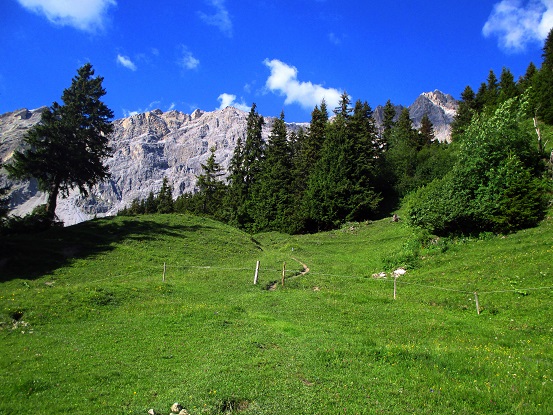 Foto: Andreas Koller / Klettersteigtour / Senda ferrada Piz Mitgel (3159m) / Rückblick zum Piz Mitgel / 18.09.2014 01:17:23